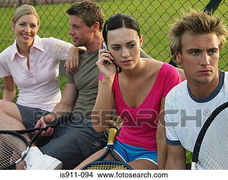 Young people at tennis court View Large Photo Image Picture - Young people at tennis court. Fotosearch