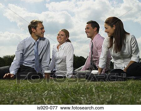 Four colleagues at lunch View Large Photo Image Stock Photo - Four colleagues at lunch. Fotosearch