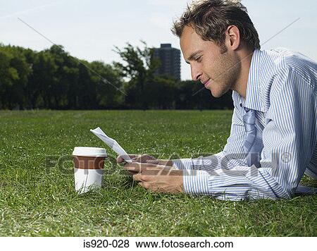 Stock Photo - Male office worker on lunch break. Fotosearch