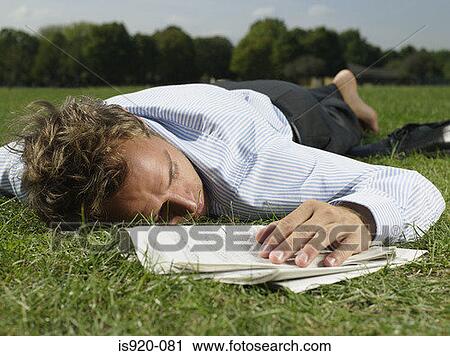 Male office worker sleeping in a park View Large Photo Image Stock Image - Male office worker sleeping in a park. Fotosearch