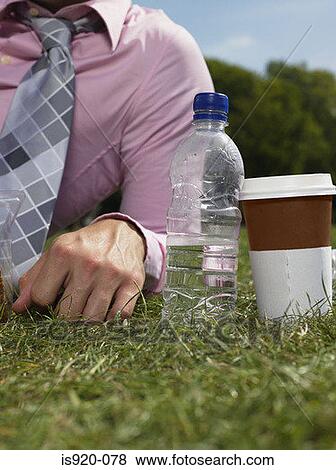Man resting in a park View Large Photo Image Stock Photo - Man resting in a park. Fotosearch