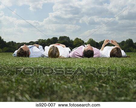 Stock Photo - Office workers lying in a row. Fotosearch