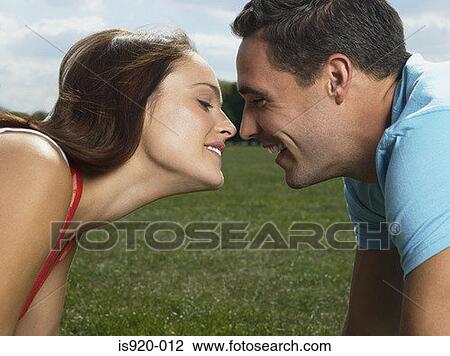 Young couple about to kiss View Large Photo Image Stock Image - Young couple about to kiss. Fotosearch