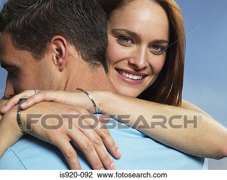 Young couple hugging View Large Photo Image Stock Image - Young couple hugging. Fotosearch