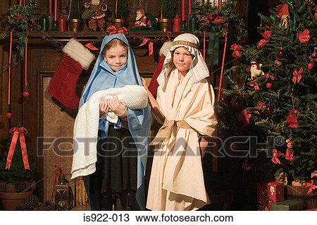 Stock Image - Children dressed as nativity characters. Fotosearch