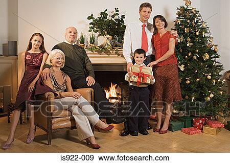 Stock Photo - Family portrait at christmas. Fotosearch