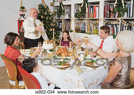 Picture - Family toasting at christmas. Fotosearch