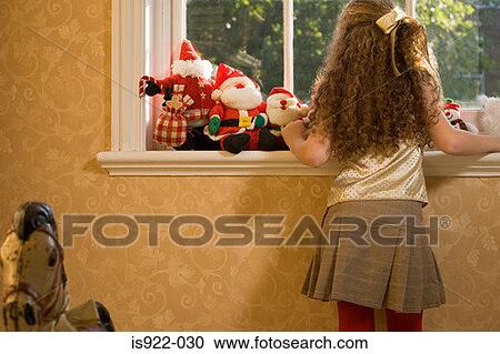 Stock Image - Girl waiting for santa claus. Fotosearch
