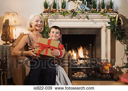 Grandmother and grandson at christmas View Large Photo Image Stock Photo - Grandmother and grandson at christmas. Fotosearch