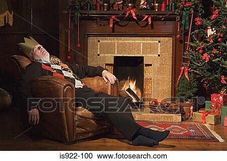 Man sleeping by fireplace View Large Photo Image Stock Image - Man sleeping by fireplace. Fotosearch