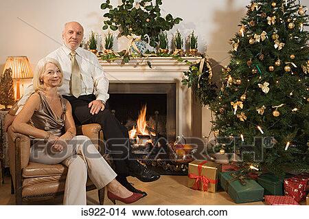 Picture - Portrait of an elderly couple at christmas. Fotosearch