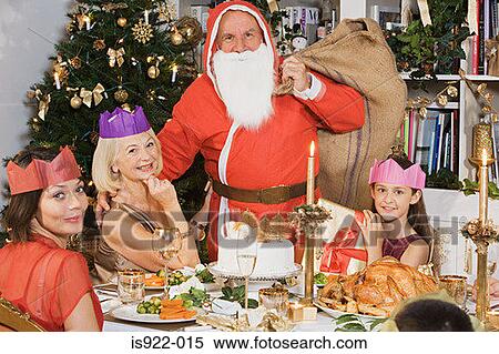 Santa claus at christmas dinner View Large Photo Image Stock Photography - Santa claus at christmas dinner. Fotosearch