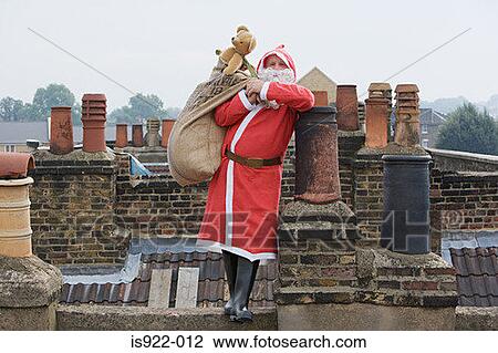 Santa claus delivering gifts View Large Photo Image Stock Image - Santa claus delivering gifts. Fotosearch