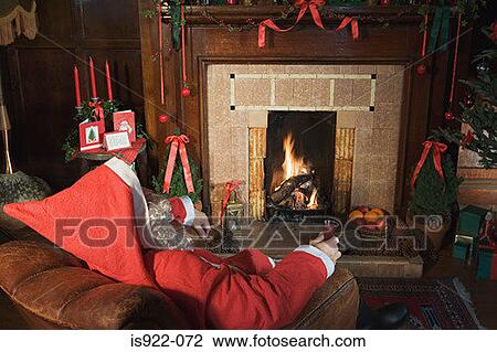 Santa claus drinking sherry by the fire View Large Photo Image Stock Image - Santa claus drinking sherry by the fire. Fotosearch