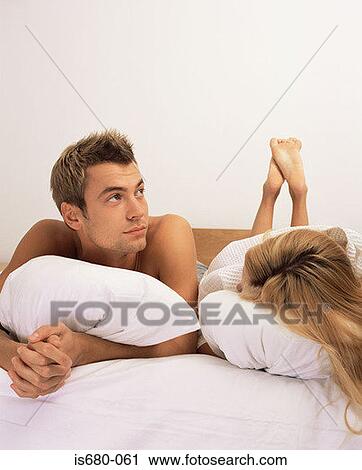 Couple in bed View Large Photo Image Stock Image - Couple in bed. Fotosearch