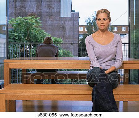 Stock Photography - Couple in their apartment. Fotosearch