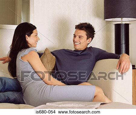 Couple on the sofa View Large Photo Image Picture - Couple on the sofa. Fotosearch