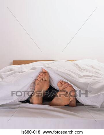 Man and woman in bed View Large Photo Image Stock Photo - Man and woman in bed. Fotosearch