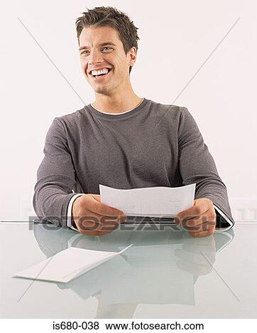 Man reading a letter View Large Photo Image Stock Photo - Man reading a letter. Fotosearch