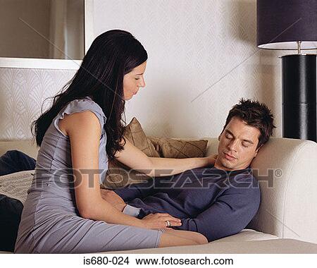 Woman and her sleeping boyfriend View Large Photo Image Picture - Woman and her sleeping boyfriend. Fotosearch
