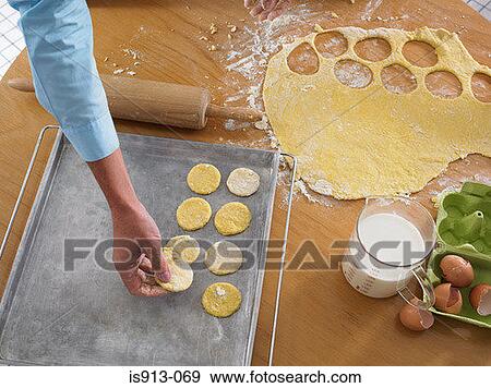 Baking biscuits View Large Photo Image Stock Photo - Baking biscuits. Fotosearch