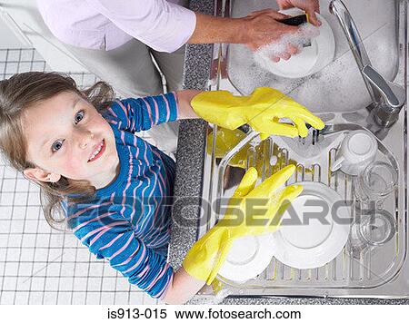Girl helping with washing up View Large Photo Image Stock Photography - Girl helping with washing up. Fotosearch