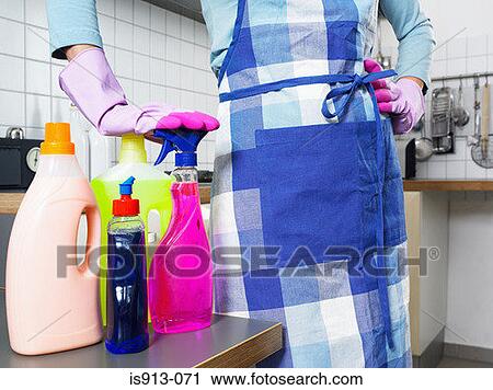 Housewife with cleaning products View Large Photo Image Stock Image - Housewife with cleaning products. Fotosearch