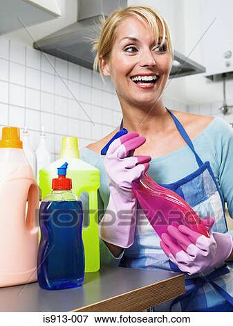 Housewife with cleaning products View Large Photo Image Stock Photo - Housewife with cleaning products. Fotosearch