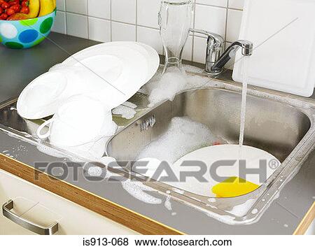 Washing up View Large Photo Image Stock Photo - Washing up. Fotosearch