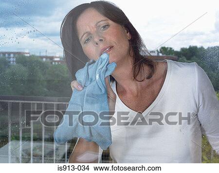 Woman cleaning window View Large Photo Image Picture - Woman cleaning window. Fotosearch