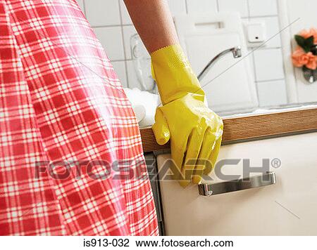 Woman doing washing up View Large Photo Image Stock Image - Woman doing washing up. Fotosearch