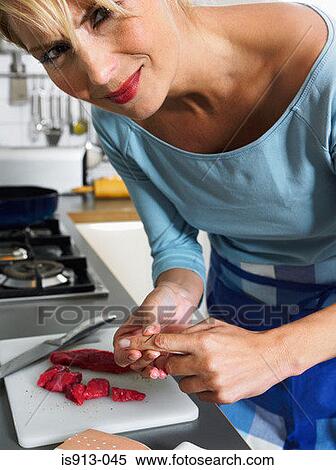 Woman with cut finger View Large Photo Image Stock Photography - Woman with cut finger. Fotosearch