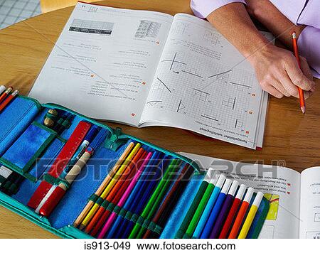 Woman with exercise books and pencil case View Large Photo Image Stock Photo - Woman with exercise books and pencil case. Fotosearch