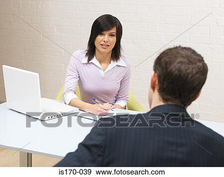 Stock Photo - An interview. Fotosearch