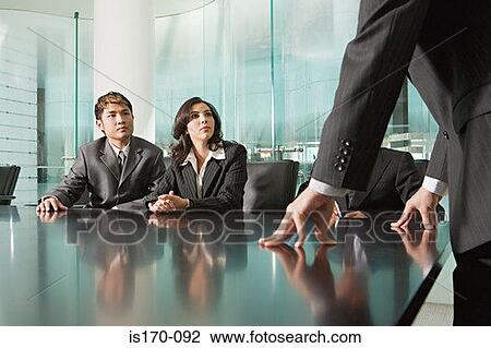 Business people in a meeting View Large Photo Image Stock Image - Business people in a meeting. Fotosearch