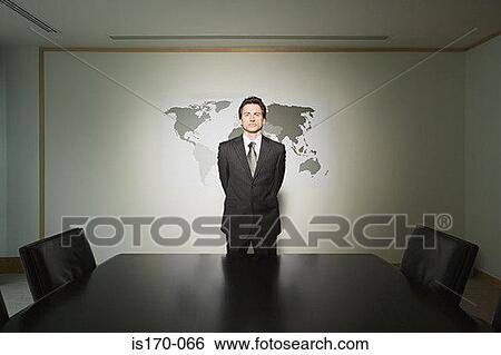 Businessman in conference room View Large Photo Image Stock Photograph - Businessman in conference room. Fotosearch