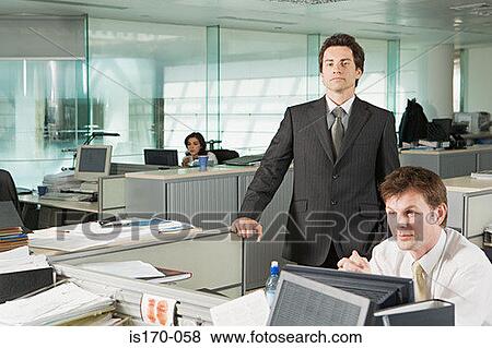 Stock Photo - Businessman in the office. Fotosearch