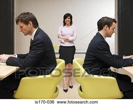 Businessmen and their manager View Large Photo Image Stock Photograph - Businessmen and their manager. Fotosearch