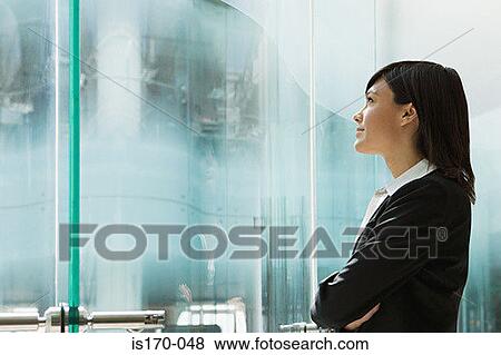 Stock Photo - Businesswoman thinking. Fotosearch