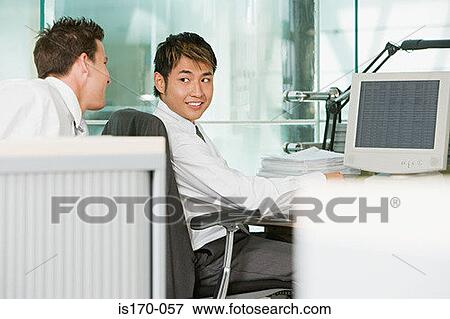 Colleagues chatting View Large Photo Image Stock Photo - Colleagues chatting. Fotosearch