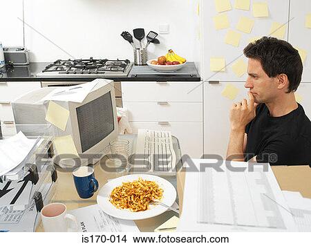 Man working in the kitchen View Large Photo Image Picture - Man working in the kitchen. Fotosearch