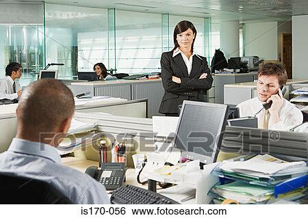 Manager and her employees View Large Photo Image Stock Photograph - Manager and her employees. Fotosearch