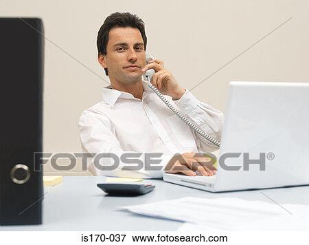 Office worker on the telephone View Large Photo Image Stock Photo - Office worker on the telephone. Fotosearch