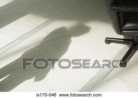 Shadow of a businessman View Large Photo Image Stock Photograph - Shadow of a businessman. Fotosearch