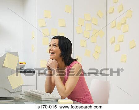 Woman in kitchen with adhesive notes View Large Photo Image Stock Photography - Woman in kitchen with adhesive notes. Fotosearch