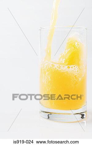 Picture - A glass of orange juice. Fotosearch