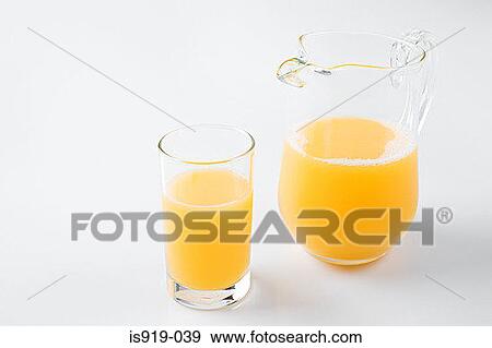 Stock Photo - A glass of orange juice. Fotosearch