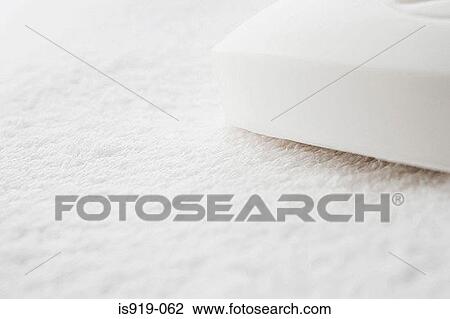 Soap on a white towel View Large Photo Image Stock Image - Soap on a white towel. Fotosearch