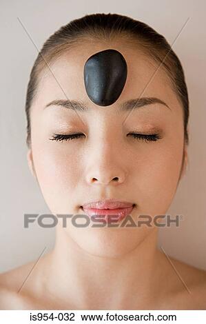 Beautiful young woman with eyes closed View Large Photo Image Stock Image - Beautiful young woman with eyes closed. Fotosearch