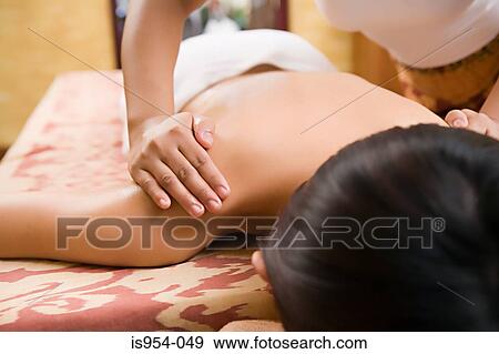 Woman having massage View Large Photo Image Stock Photo - Woman having massage. Fotosearch